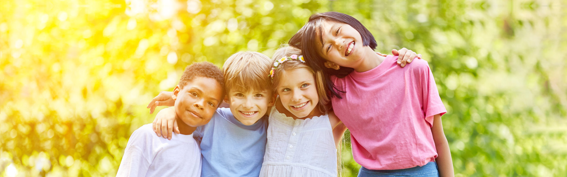 a group of children hugging